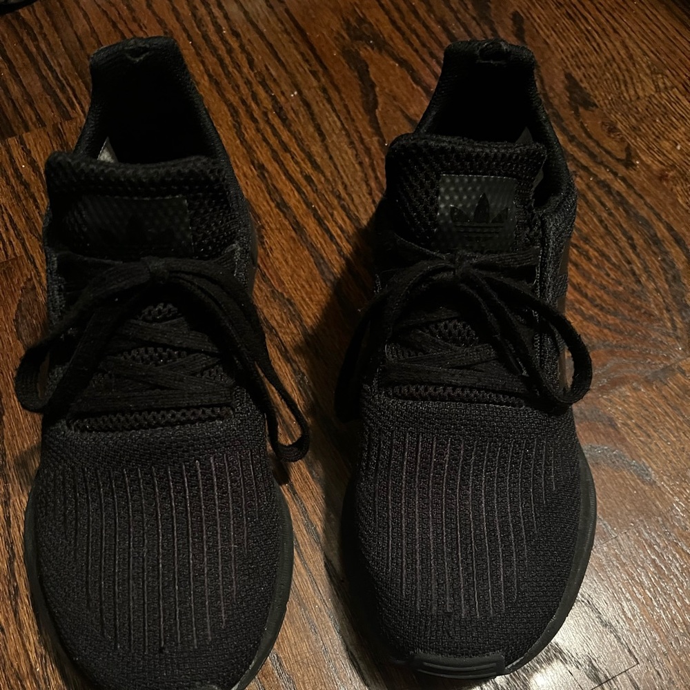 Adidas sneakers user.  No smells, rips or stains of note.